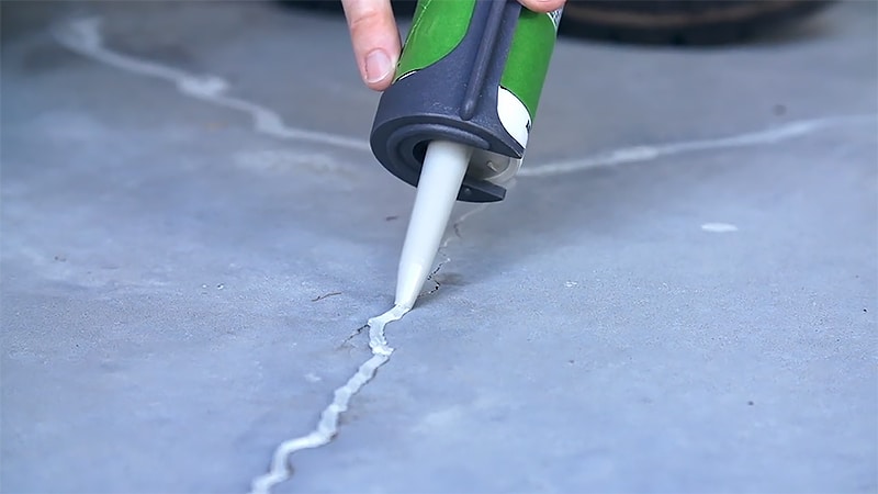 Repair the cracks before Seal a Garage Floor