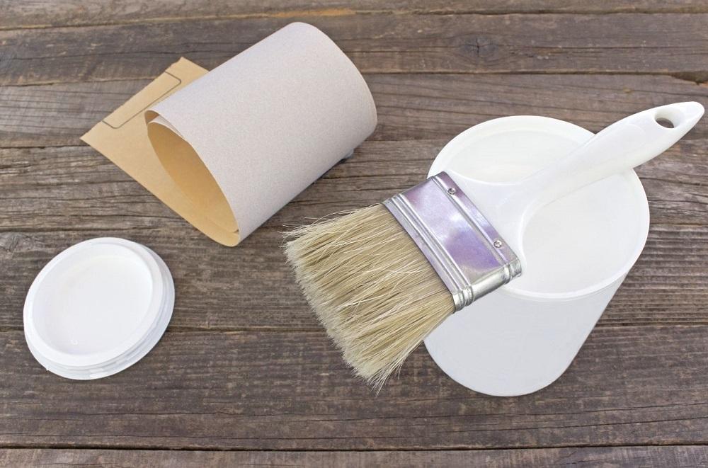  FREE White enamel paint with brush and sandpaper on old wood